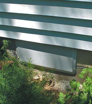 A gray crawl space vent cover in Olympic Valley